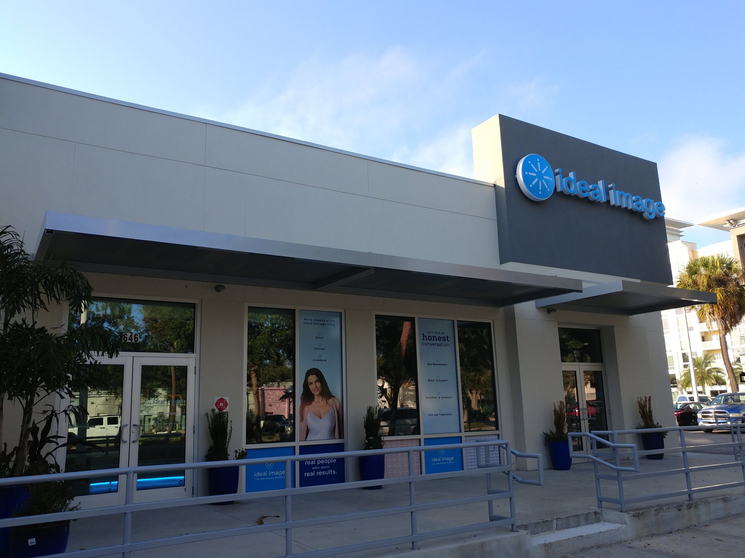 Flat-panel aluminum roof over a commercial entrance