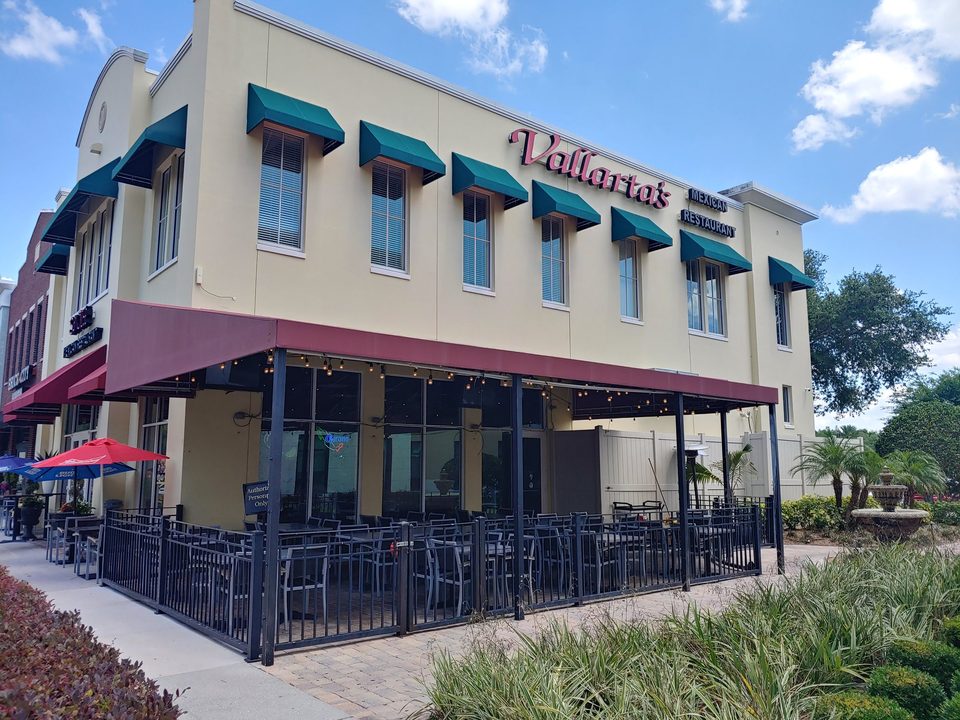 Large awning covering a restaurant patio